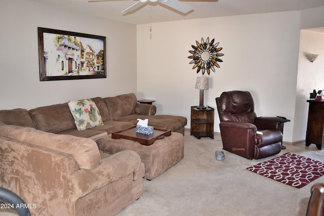 living room with light carpet and a textured ceiling