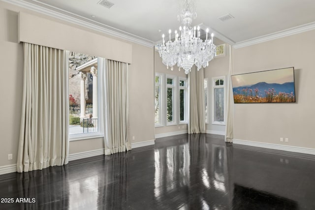 empty room with ornamental molding and a chandelier