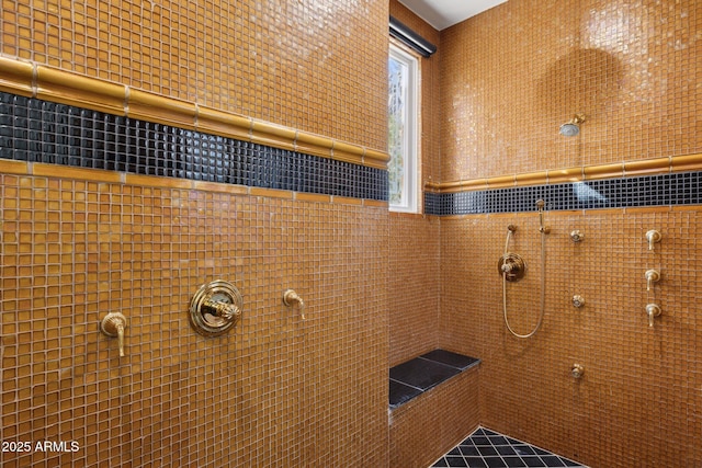 bathroom featuring tiled shower