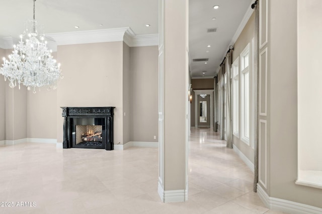 hallway featuring crown molding and an inviting chandelier