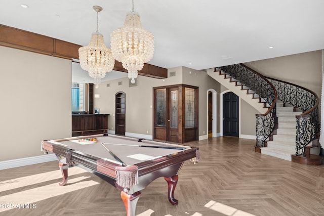 rec room with billiards and light parquet floors