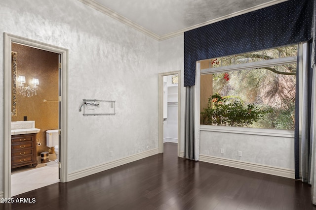 interior space featuring ornamental molding and dark hardwood / wood-style flooring