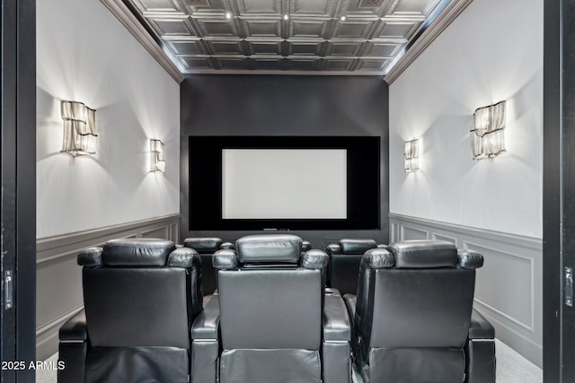 home theater room with ornamental molding