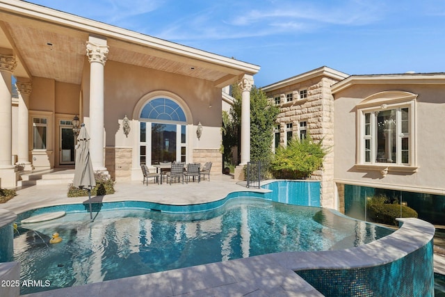 view of pool with a patio