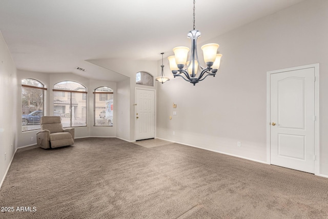 interior space featuring baseboards, carpet flooring, visible vents, and a notable chandelier