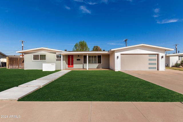 ranch-style home with a porch, a garage, and a front lawn