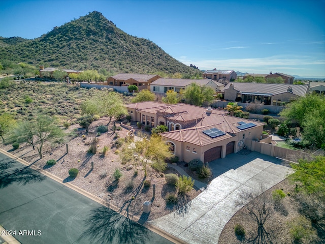 drone / aerial view featuring a mountain view