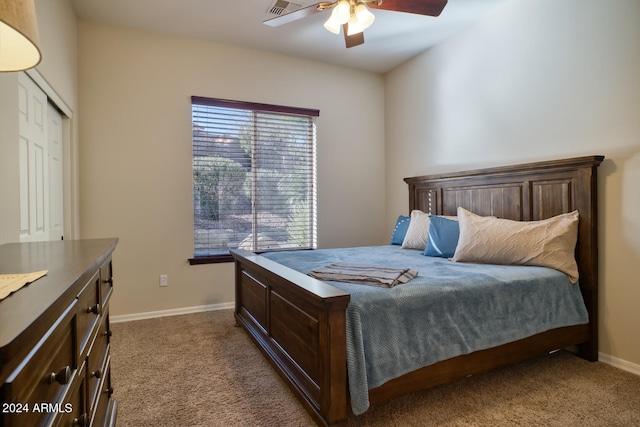 bedroom featuring carpet floors, a closet, and ceiling fan