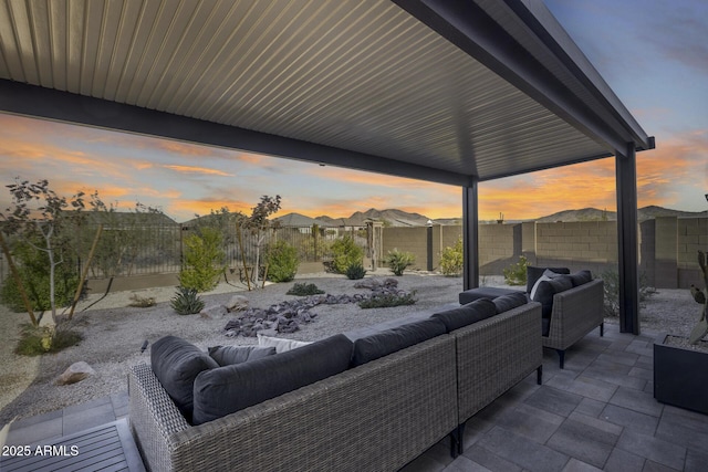 patio terrace at dusk with outdoor lounge area