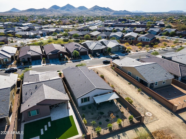 birds eye view of property featuring a mountain view