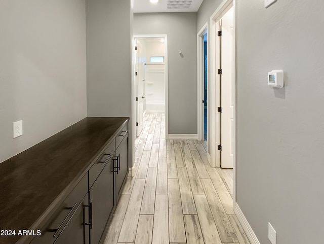 hall featuring light hardwood / wood-style flooring