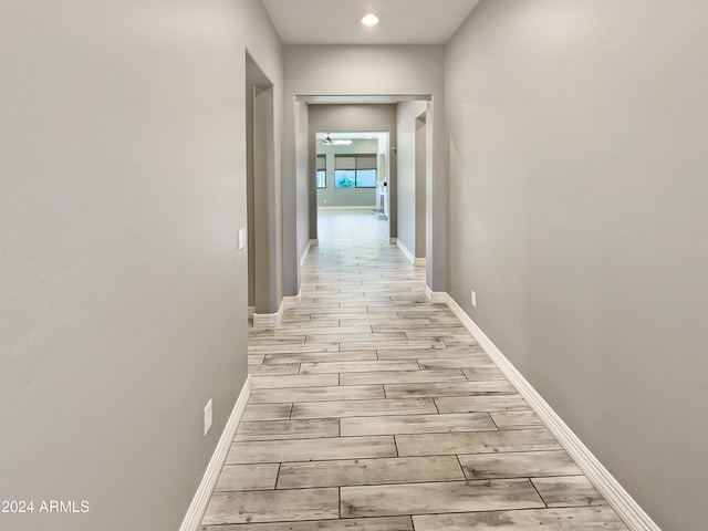 hall featuring light wood-type flooring