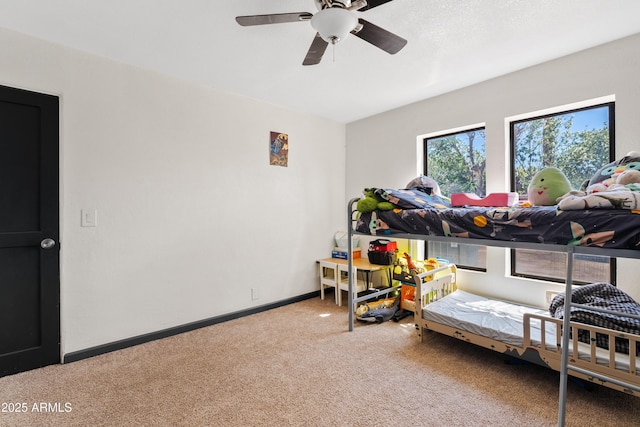 599 W Vah Ki Inn Rd, Coolidge, AZ 85128 - carpeted bedroom with baseboards and a ceiling fan