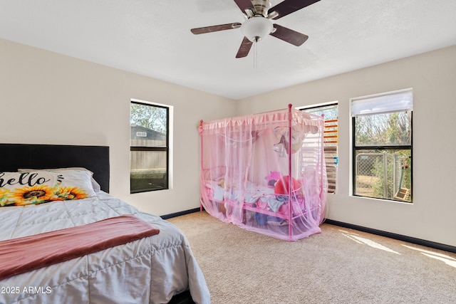 599 W Vah Ki Inn Rd, Coolidge, AZ 85128 - bedroom featuring carpet, baseboards, and ceiling fan
