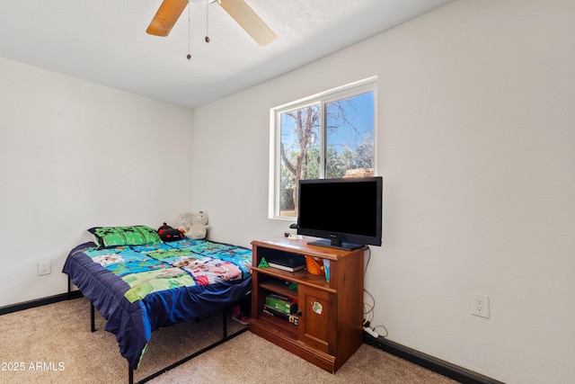 599 W Vah Ki Inn Rd, Coolidge, AZ 85128 - carpeted bedroom with baseboards and ceiling fan