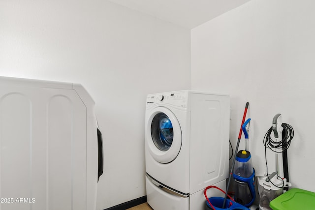 599 W Vah Ki Inn Rd, Coolidge, AZ 85128 - clothes washing area featuring washing machine and clothes dryer