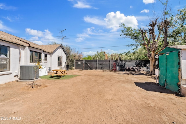 599 W Vah Ki Inn Rd, Coolidge, AZ 85128 - view of yard with cooling unit and fence