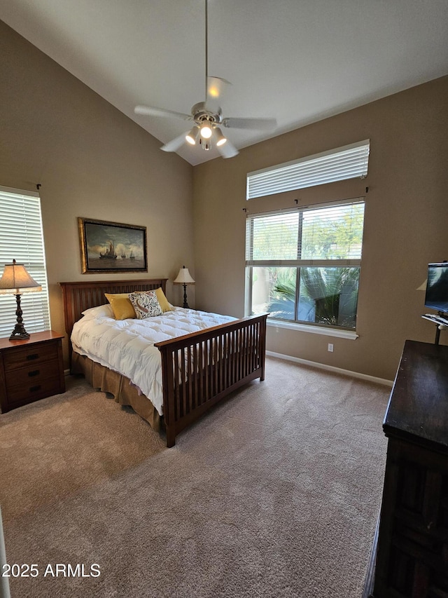 carpeted bedroom featuring ceiling fan and lofted ceiling