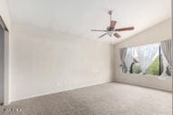 bonus room featuring carpet flooring and lofted ceiling