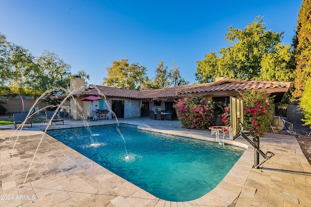 pool featuring a patio