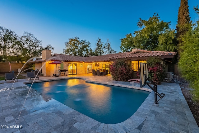 pool featuring a patio