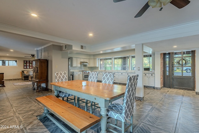 dining space with recessed lighting, visible vents, ornamental molding, and ceiling fan