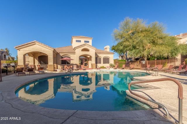 view of pool featuring a patio area