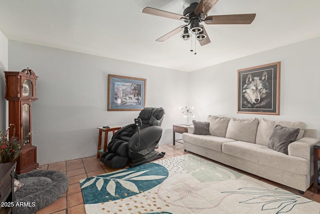 living area featuring tile patterned floors and ceiling fan