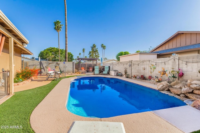 view of pool featuring a fenced in pool, a fenced backyard, and a patio area