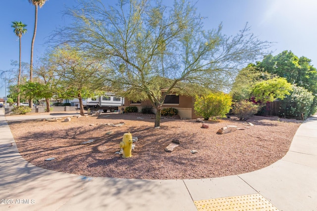 view of front of home with fence