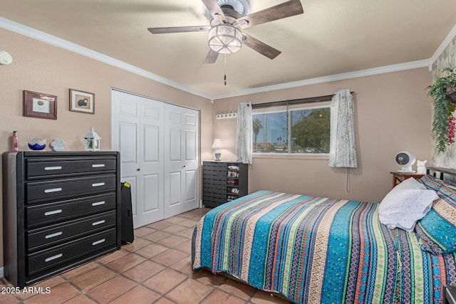 bedroom with a ceiling fan, ornamental molding, tile patterned flooring, and a closet
