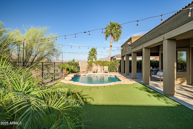 view of swimming pool with a patio, a fenced backyard, and a fenced in pool