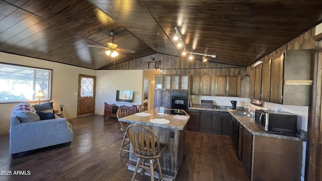 kitchen with a kitchen island, dark hardwood / wood-style floors, sink, and wooden ceiling