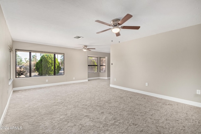 carpeted empty room with ceiling fan