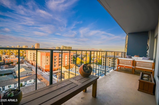 view of balcony at dusk