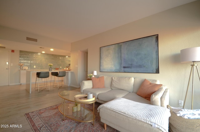 living room featuring light hardwood / wood-style floors