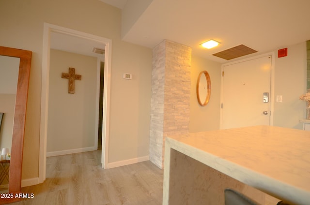 kitchen with light hardwood / wood-style floors