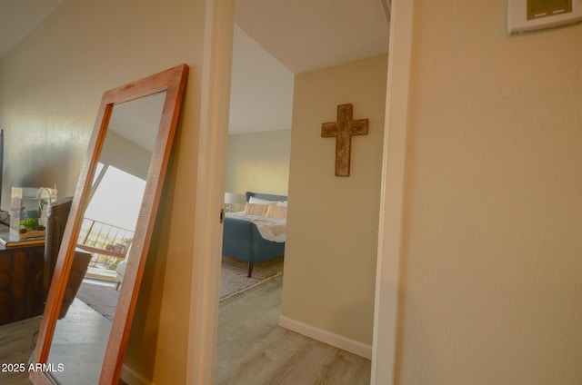 corridor featuring light hardwood / wood-style floors