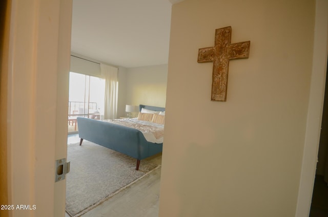 bedroom featuring hardwood / wood-style flooring