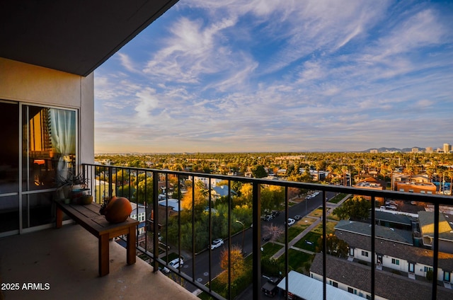 view of balcony at dusk