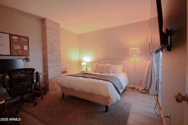 bedroom featuring light hardwood / wood-style floors