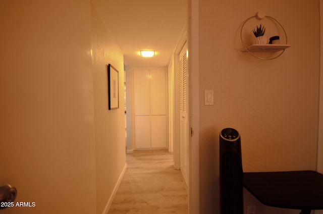 corridor featuring light hardwood / wood-style floors