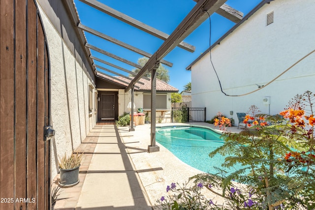 view of pool with a fenced in pool and a patio area