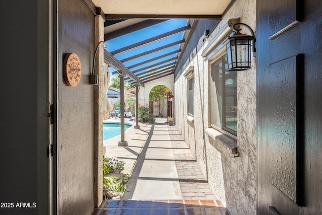 view of patio / terrace with a fenced in pool
