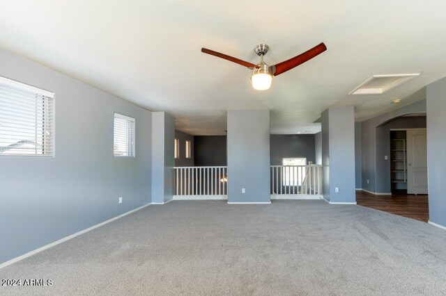 spare room featuring carpet flooring and ceiling fan