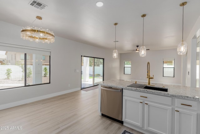 742 W Vineyard Plains Dr, San Tan Valley, AZ 85143 - kitchen featuring stainless steel dishwasher, light wood-style flooring, a chandelier, white cabinetry, and light stone counters
