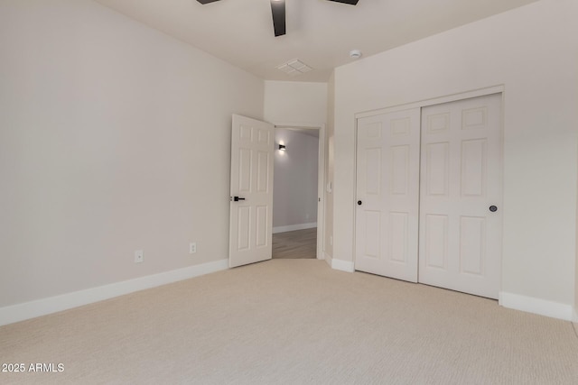 742 W Vineyard Plains Dr, San Tan Valley, AZ 85143 - unfurnished bedroom featuring carpet flooring, a closet, and a ceiling fan