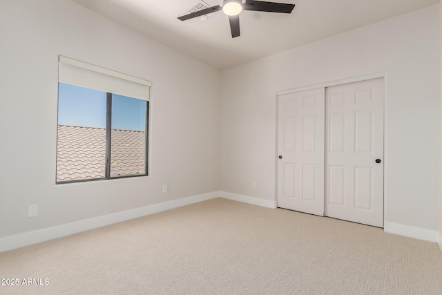 742 W Vineyard Plains Dr, San Tan Valley, AZ 85143 - unfurnished bedroom with carpet flooring, a closet, and a ceiling fan