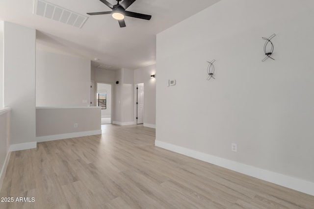 742 W Vineyard Plains Dr, San Tan Valley, AZ 85143 - empty room with a ceiling fan and light wood-style floors