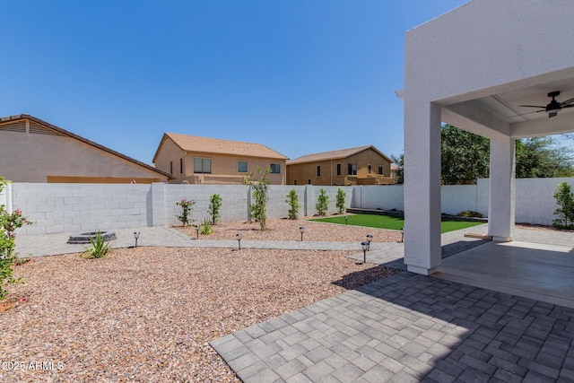 742 W Vineyard Plains Dr, San Tan Valley, AZ 85143 - fenced backyard with a ceiling fan and a patio